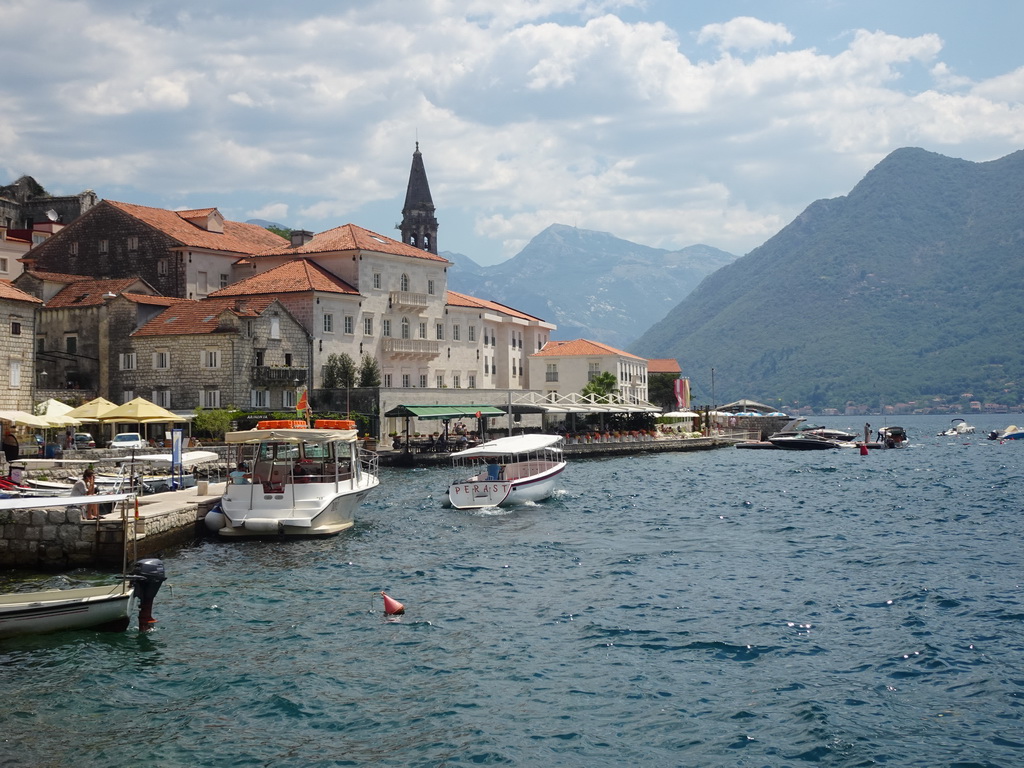 The Church of Saint Nicholas and boats at the Bay of Kotor, viewed from the promenade