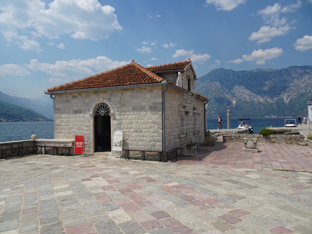 Shop, pillar and naval beacon at the northwest side of the Our Lady of the Rocks Island