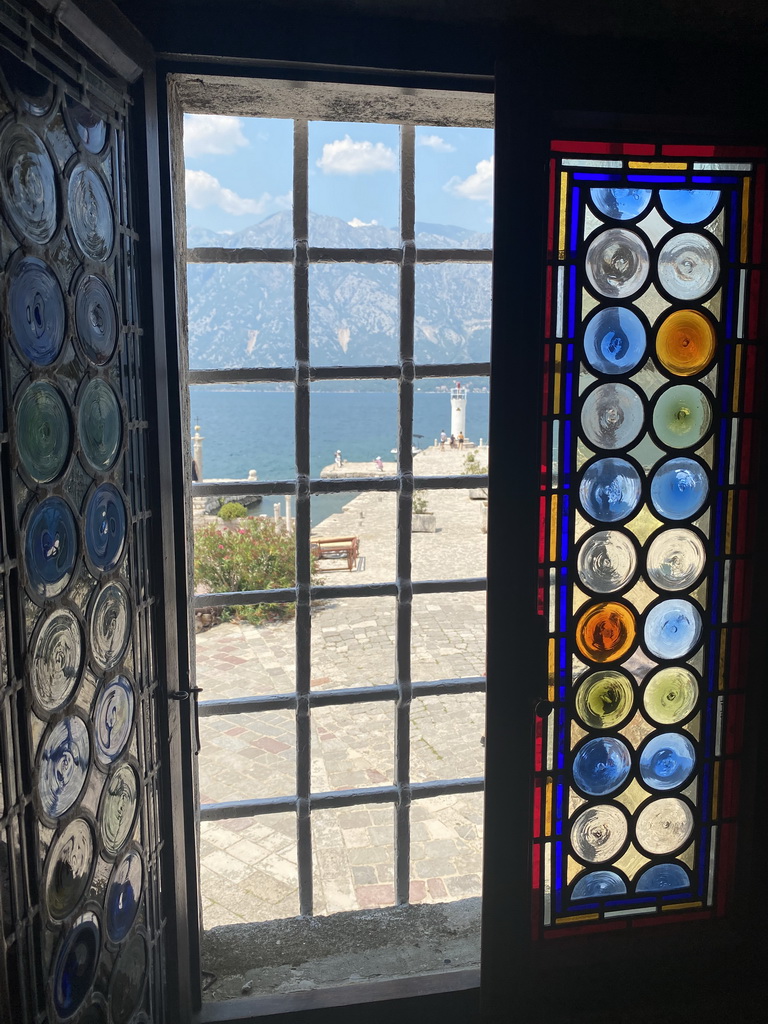 Pillar and naval beacon at the northwest side of the Our Lady of the Rocks Island, viewed from the upper floor of the museum at the Church of Our Lady