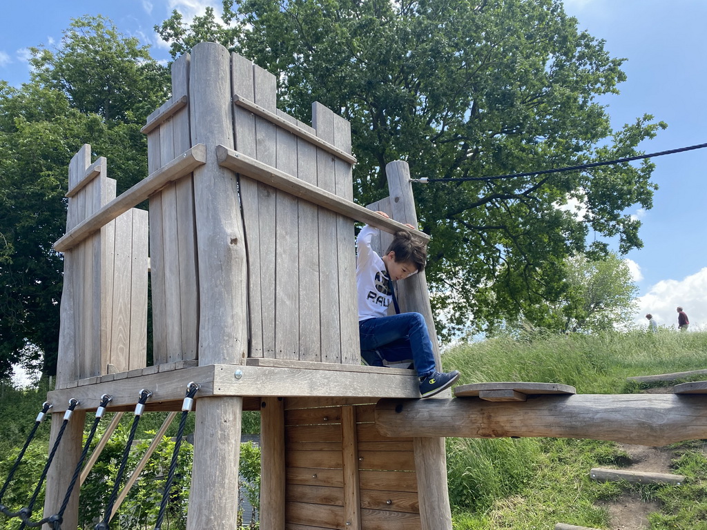 Max at the playground at the main square at Loevestein Castle