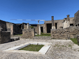 Walls and columns at the House of Romulus and Remus at the Pompeii Archeological Site