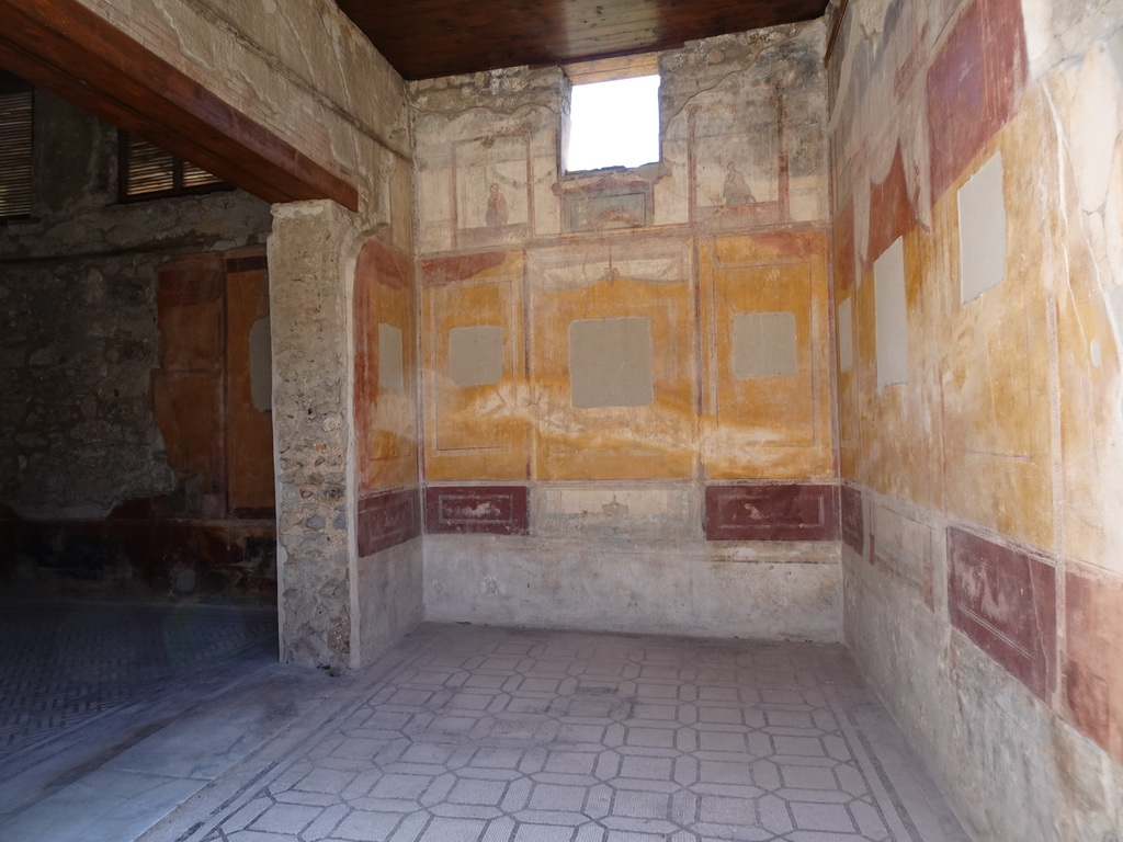 Walls with frescoes at the House of Marcus Lucretius at the Pompeii Archeological Site