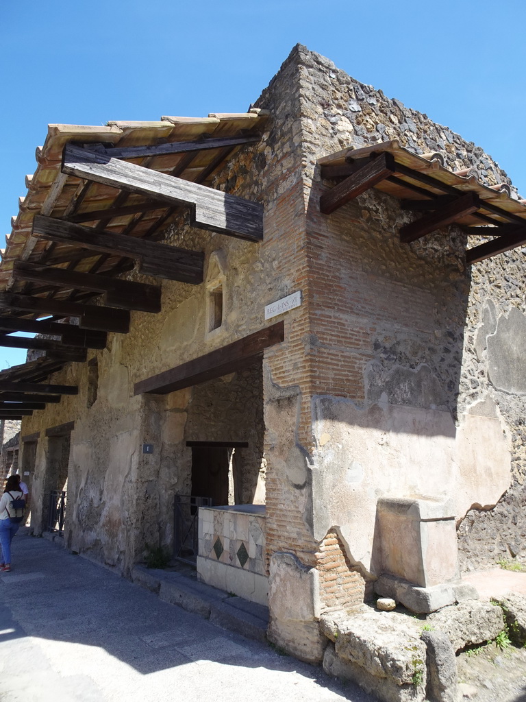 Front of houses at the Via dell`Abbondanza street at the Pompeii Archeological Site