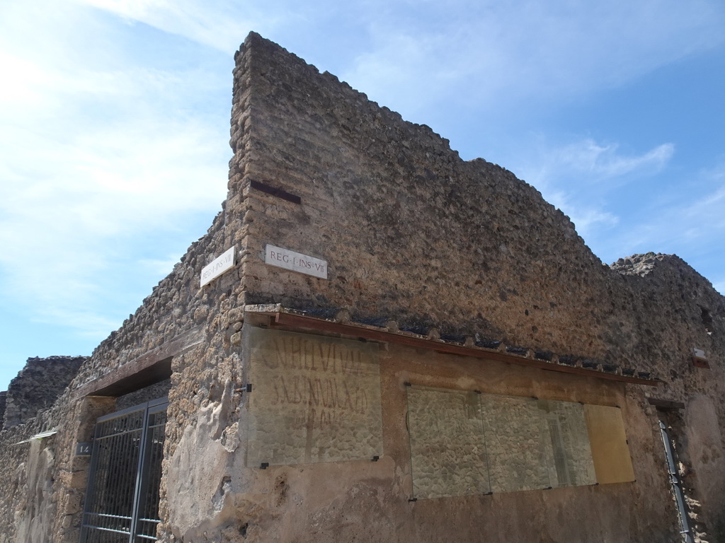 Inscriptions on the wall of a building at the Via di Castricio street at the Pompeii Archeological Site