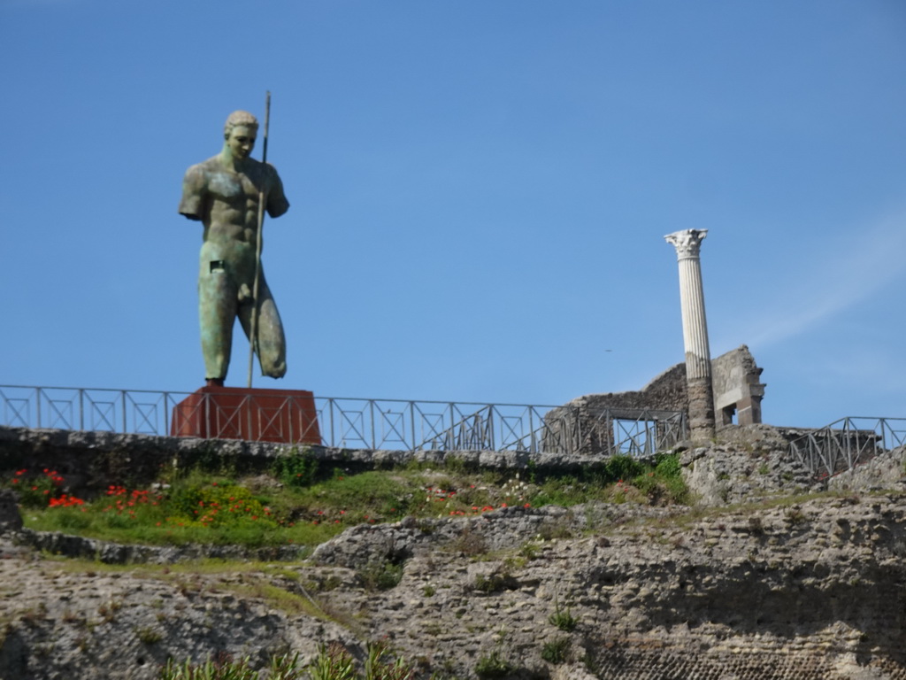 Statue of Daedalus by Igor Mitoraj at the Sanctuary of Venus at the Pompeii Archeological Site, viewed from the path next to the Antiquarium