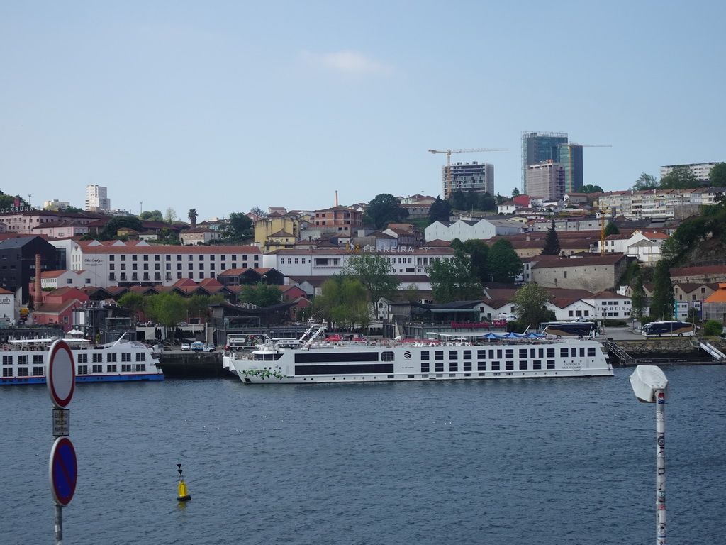 Boat on the Douro river and Vila Nova de Gaia, viewed from the sightseeing bus on the Rua Nova da Alfândega street