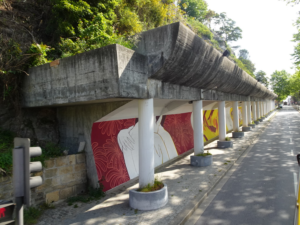 Wall painting at the Rua da Restauração street, viewed from the sightseeing bus