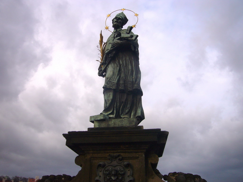 The statue of St. John of Nepomuk, at Charles Bridge