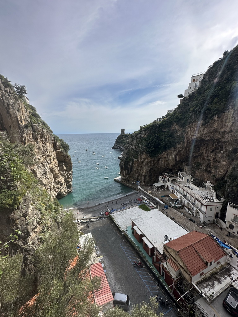 The Marina di Praia beach, the Torre Asciola tower and the Tyrrhenian Sea, viewed from a parking lot next to the Amalfi Drive