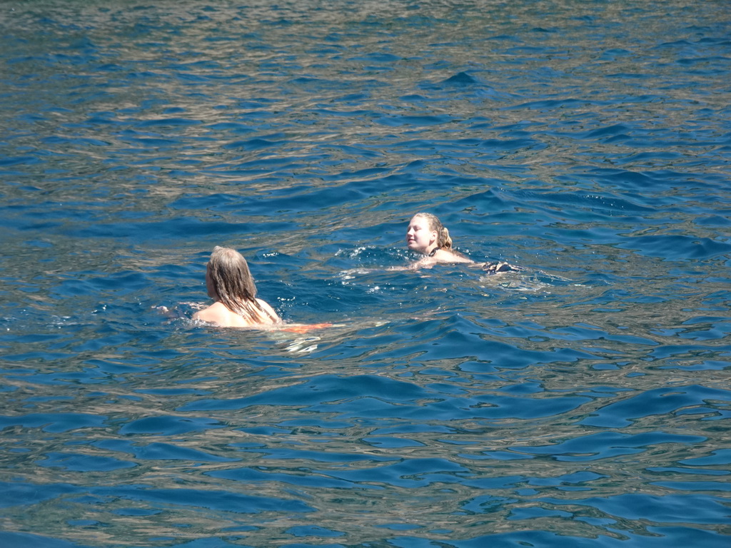 People swimming in front of the coastline just east of the town, viewed from the Sagitarius Cat boat