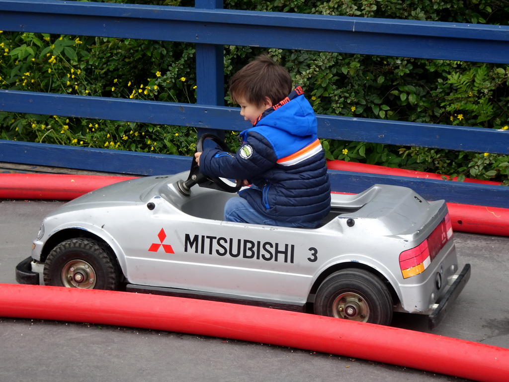 Max in a bumper car at the Fjölskyldugarðurinn park