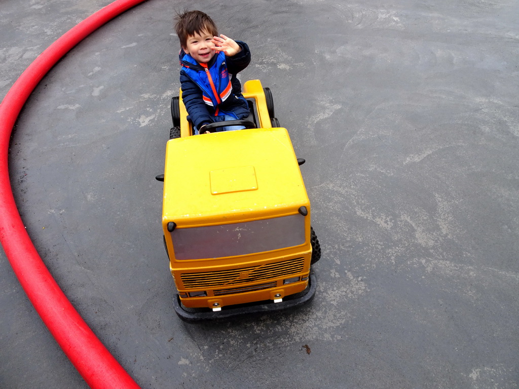 Max in a bumper truck at the Fjölskyldugarðurinn park