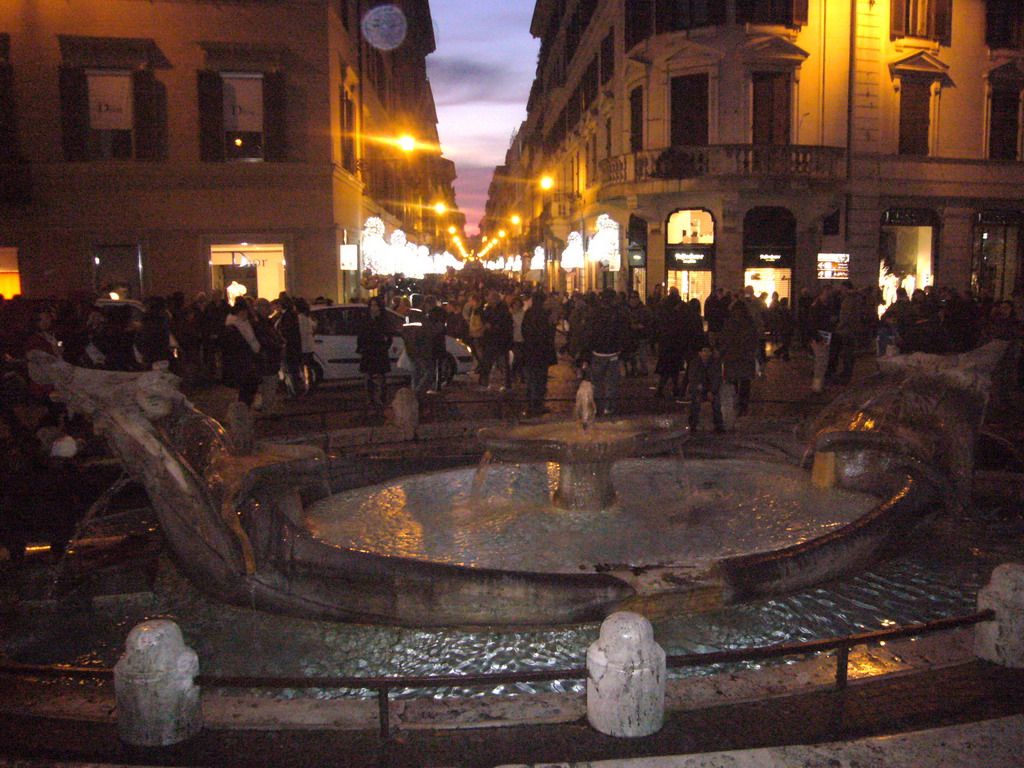 The Fontana della Barcaccia fountain at the Piazza di Spagna square, by night