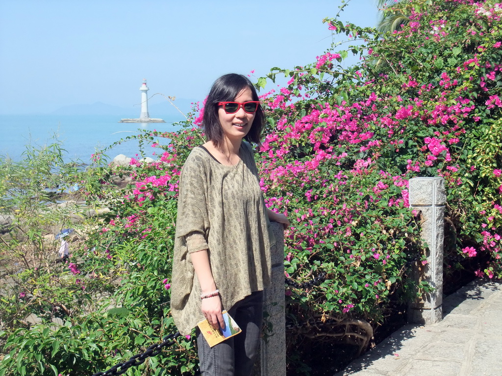 Mengjin with plants and the Tower at Territorial Sea Base Point at the Sanya Nanshan Dongtian Park