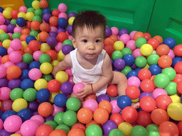 Max playing in the ball pit in the Play Room of the InterContinental Sanya Haitang Bay Resort