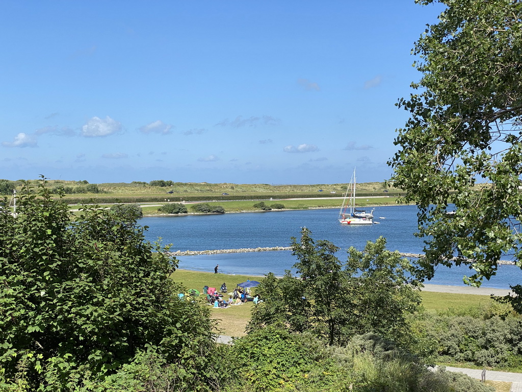 The Brouwersdam and a boat in the Grevelingenmeer lake, viewed from the staircase from the Rampweg road to the West Repart beach