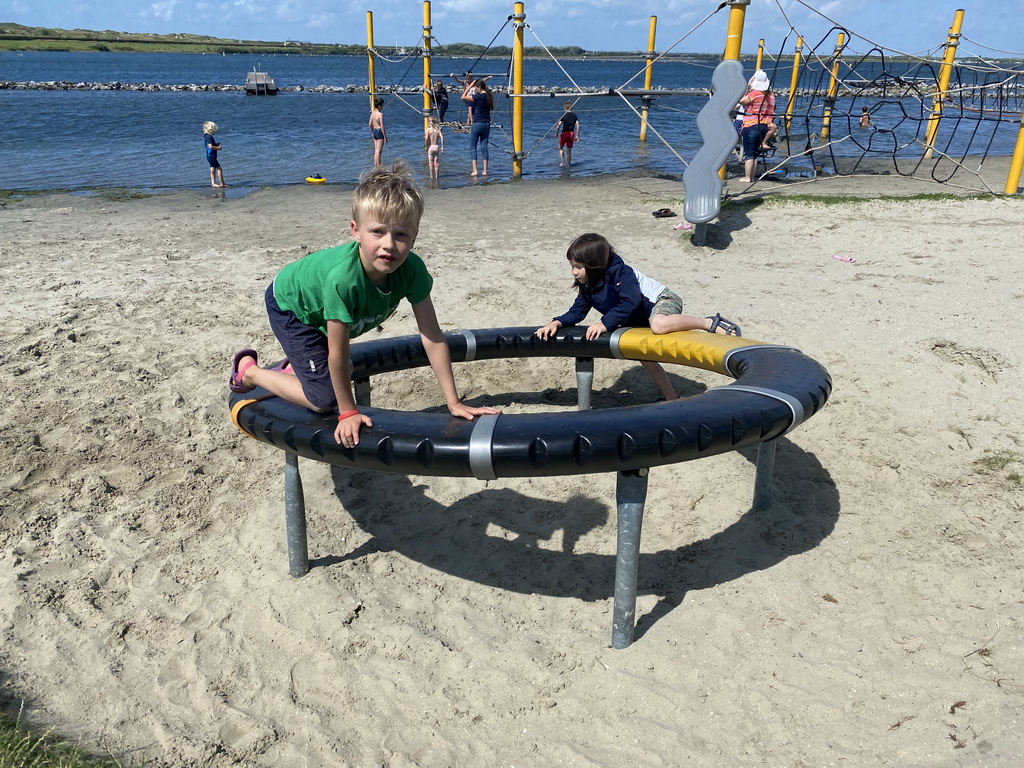 Max and his friend at the Water Playground at the West Repart beach