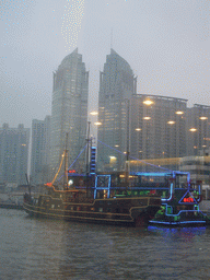 Huaxia Financial Square Towers and restaurant boat, viewed from the Huangpu river ferry