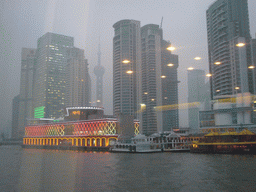 The Pudong district with the Oriental Pearl Tower and restaurant boats, viewed from the Huangpu river ferry