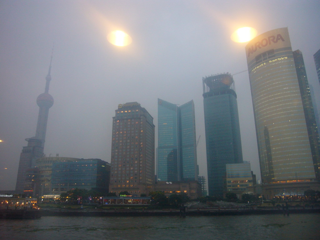 The Pudong district with the Oriental Pearl Tower, the Pudong Shangri-La Hotel, the Shanghai International Finance Center and the Aurora Building, viewed from the Huangpu river ferry