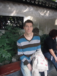 Tim on a bench in the Yuyuan Garden in the Old Town