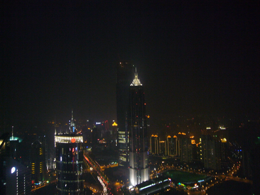 View on the Jin Mao Tower, the Bank of China Tower and the Shanghai World Financial Center (under construction), from the top of the Oriental Pearl Tower, by night