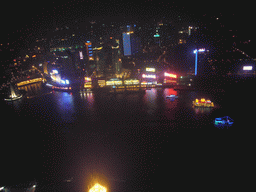 View on the northern part of the Huangpu river and surroundings, with the Monument to the People`s Heroes at Huangpu Park, the Hyatt on the Bund and other skyscrapers, from the top of the Oriental Pearl Tower, by night