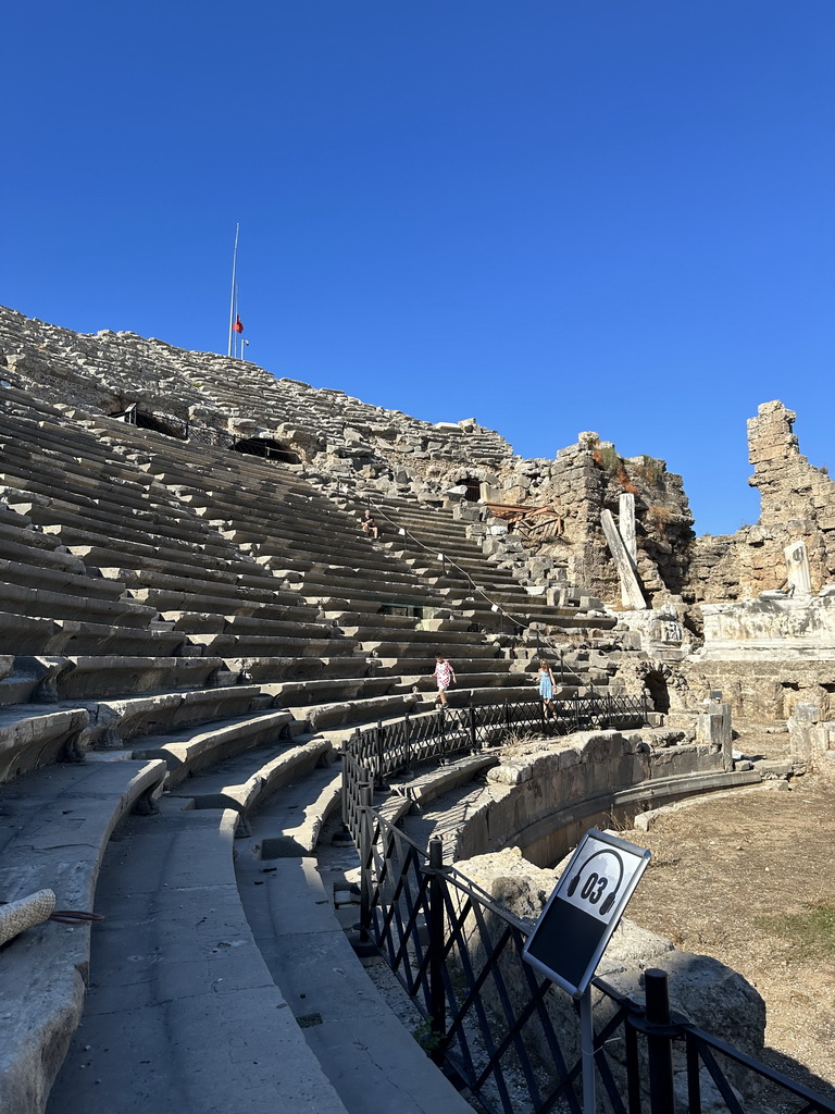 Max at the bottom of the northwest auditorium of the Roman Theatre of Side, viewed from the bottom of the southwest auditorium