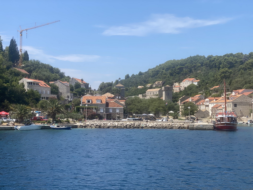 Boats at the Sudurad Harbour and the town of Sudurad, viewed from the Elaphiti Islands tour boat