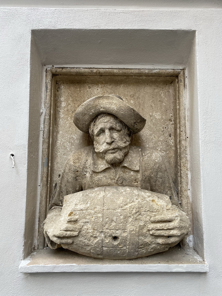 Relief in front of the Church of Santi Felice and Baccolo at the Via Torquato Tasso street