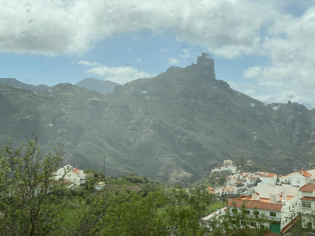 The Roque Bentayga rock and the north side of the town, viewed from the tour bus on the GC-60 road