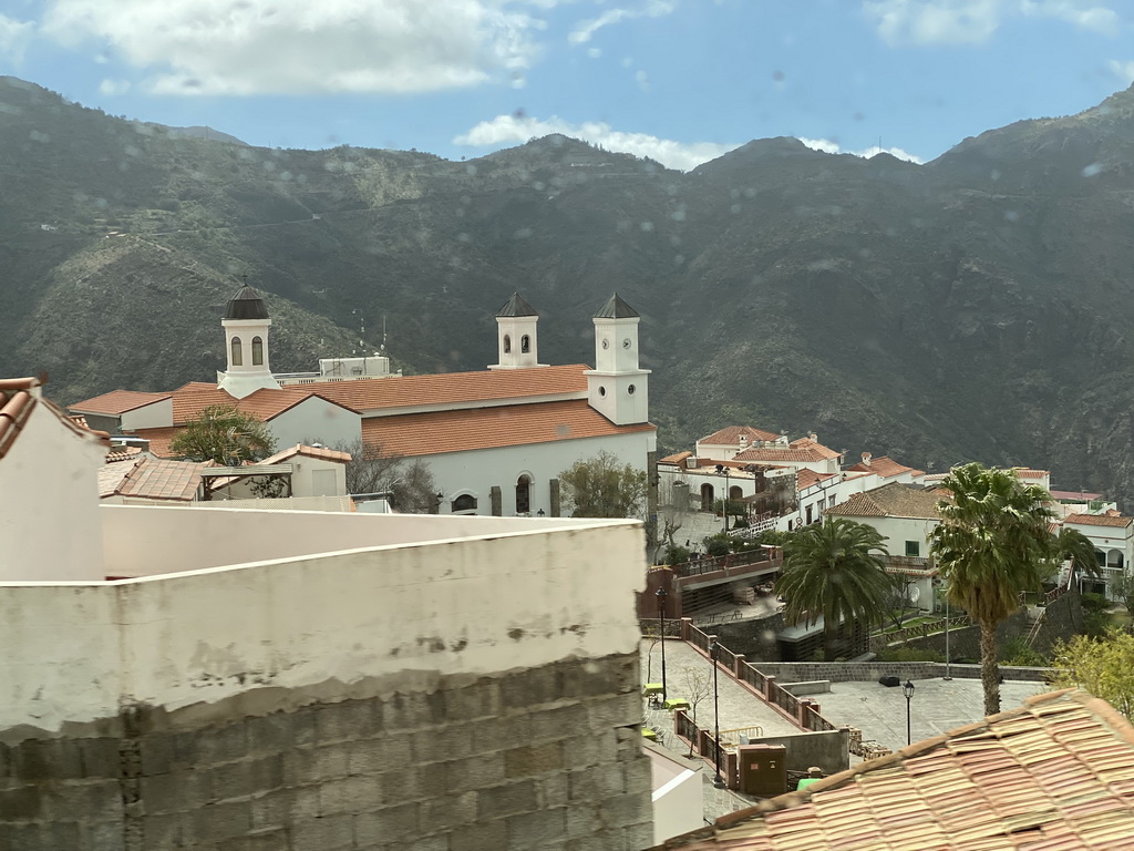 The town center with the Parroquia de Nuestra Señora del Socorro church, viewed from the tour bus on the GC-60 road