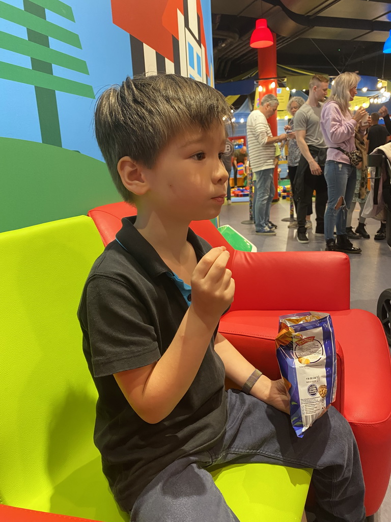 Max eating chips at the Legoland Discovery Centre