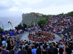 The Amphitheatre of the Pura Luhur Uluwatu temple, with people performing the Sanghyang dance during the Kecak and Fire Dance