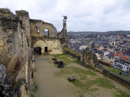 The Knight`s Hall and weather vane at the ruins of Valkenburg Castle, and the town center with the Church of St. Nicolas and St. Barbara and the Geulpoort gate, viewed from the Stair Tower