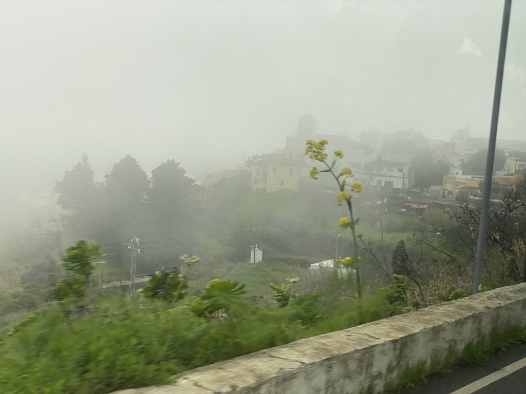 The town center with the Iglesia De San Bartolome De Las Lagunetas church, viewed from the tour bus on the GC-155 road