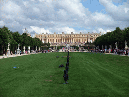 The Tapis Vert lawn, the Bassin de Latone fountain and both Bassin des Lézards fountains in the Gardens of Versailles and the back side of the Palace of Versailles