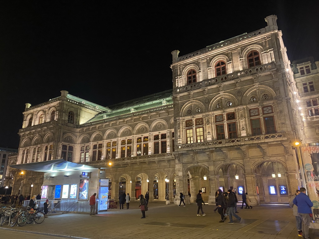 East side of the Wiener Staatsoper building at the Kärntner Straße street, by night