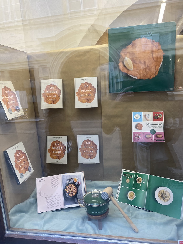 Pan, poster and books on Wiener Schnitzels at the window of the Figlmüller at Bäckerstraße Restaurant at the Bäckerstraße street