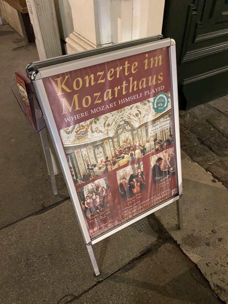 Sign of the `Concert in Mozart`s House` in front of the Deutschordenshaus Wien at the Singerstraße street, by night