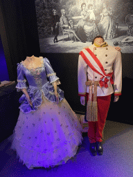 Max with statues of Empress Sisi and Emperor Franz Joseph I at the lobby of the Sisi`s Amazing Journey museum