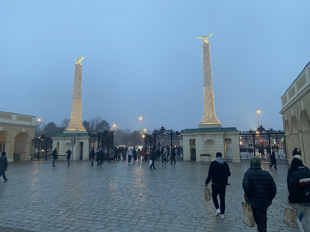 Entrance gate to the Schönbrunn Palace at the Schönbrunner Schloßstraße street, at sunset