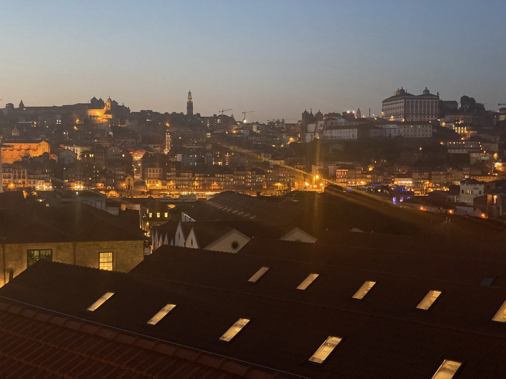 The city center and Porto with the Igreja de Nossa Senhora da Vitória church, the Torre dos Clérigos tower, the Igreja dos Grilos church and the Paço Episcopal do Porto palace, viewed from the Main Square at the WOW Cultural District, at sunset