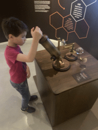 Max with a machine at the Planet Cork museum at the WOW Cultural District